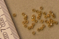 Gouden knijpkralen rond 2500 st.