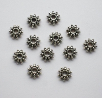 Metalen spacers 9 mm 12 stuks.